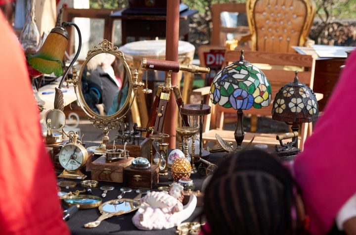 Vintage items for sale at a stall on street flea market.