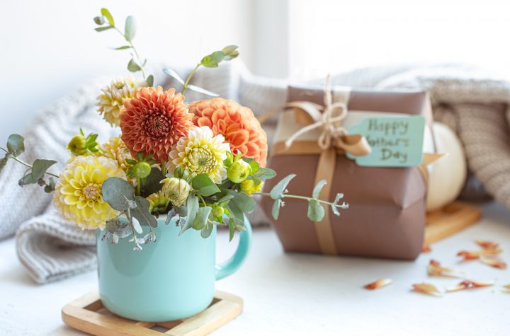 Festive composition for mother's day with gift box and flowers.