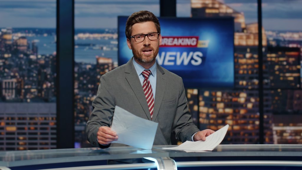 Man newsreader reporting reportage at newscast modern