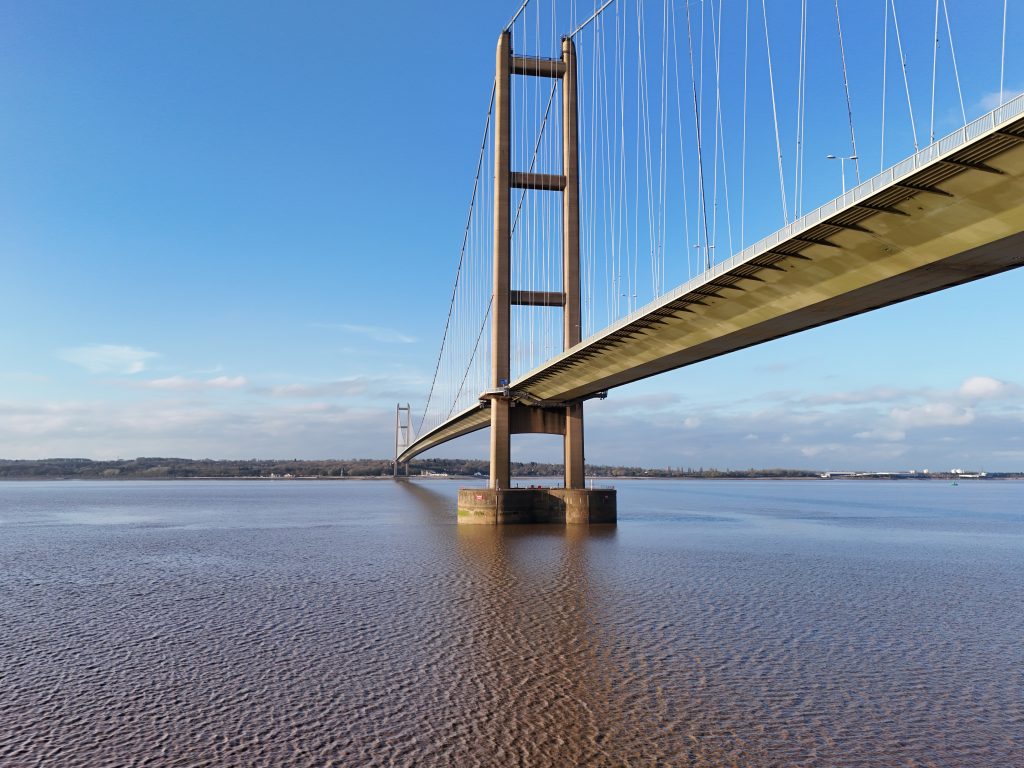 The iconic Humber Bridge under a blue, cloudy sky